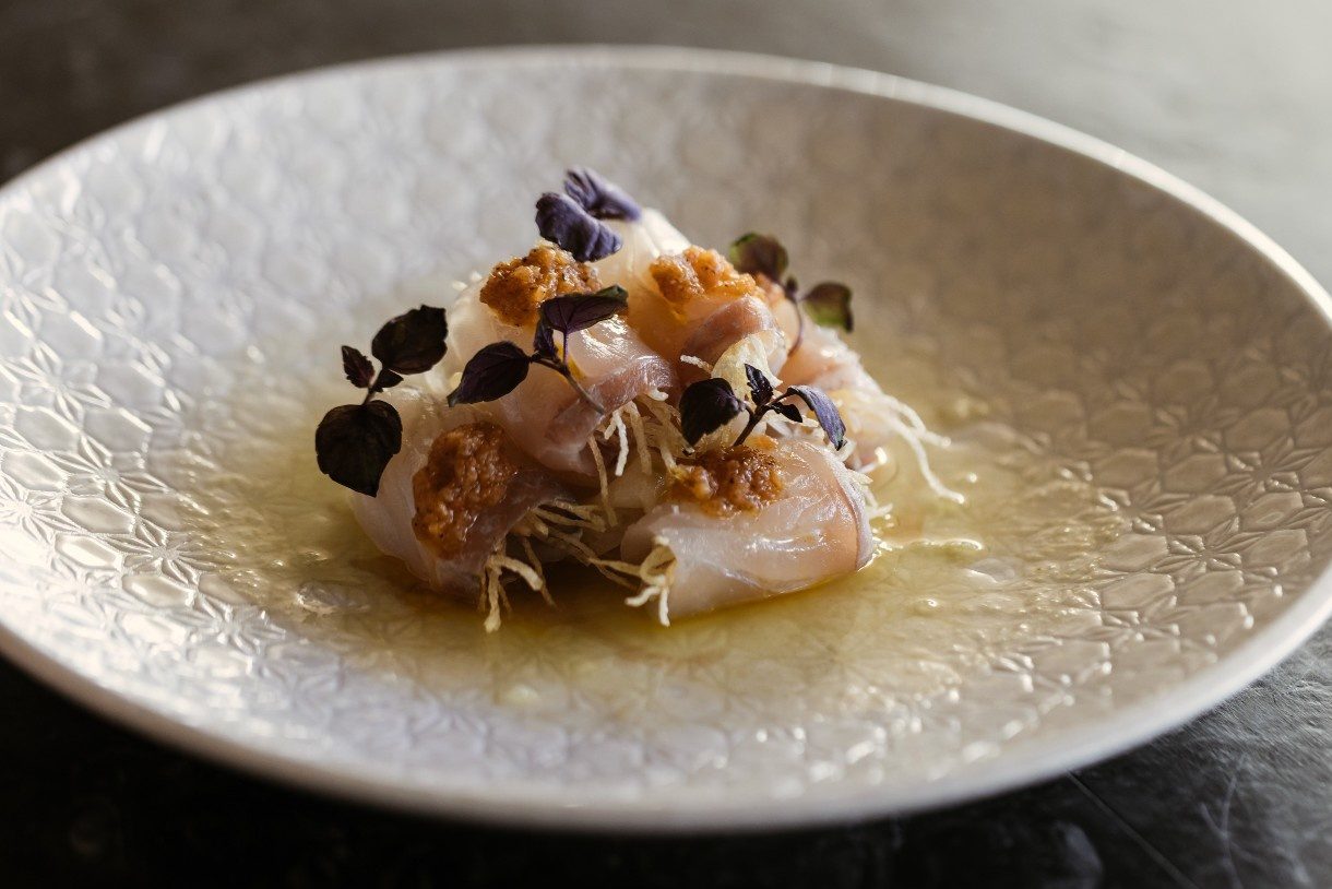 delicate japanese dish on a white plate