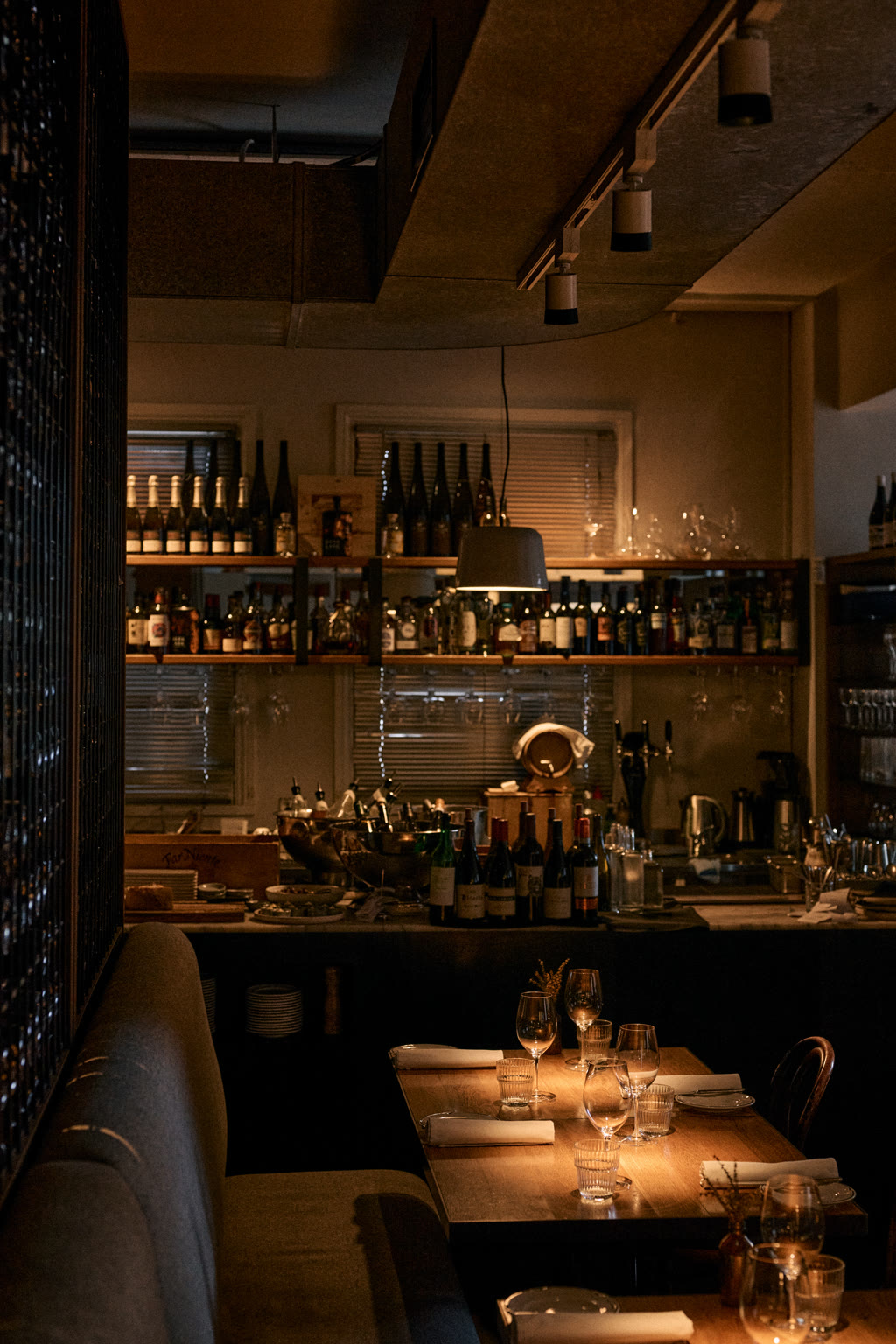 Warmly lit up bar and seating area